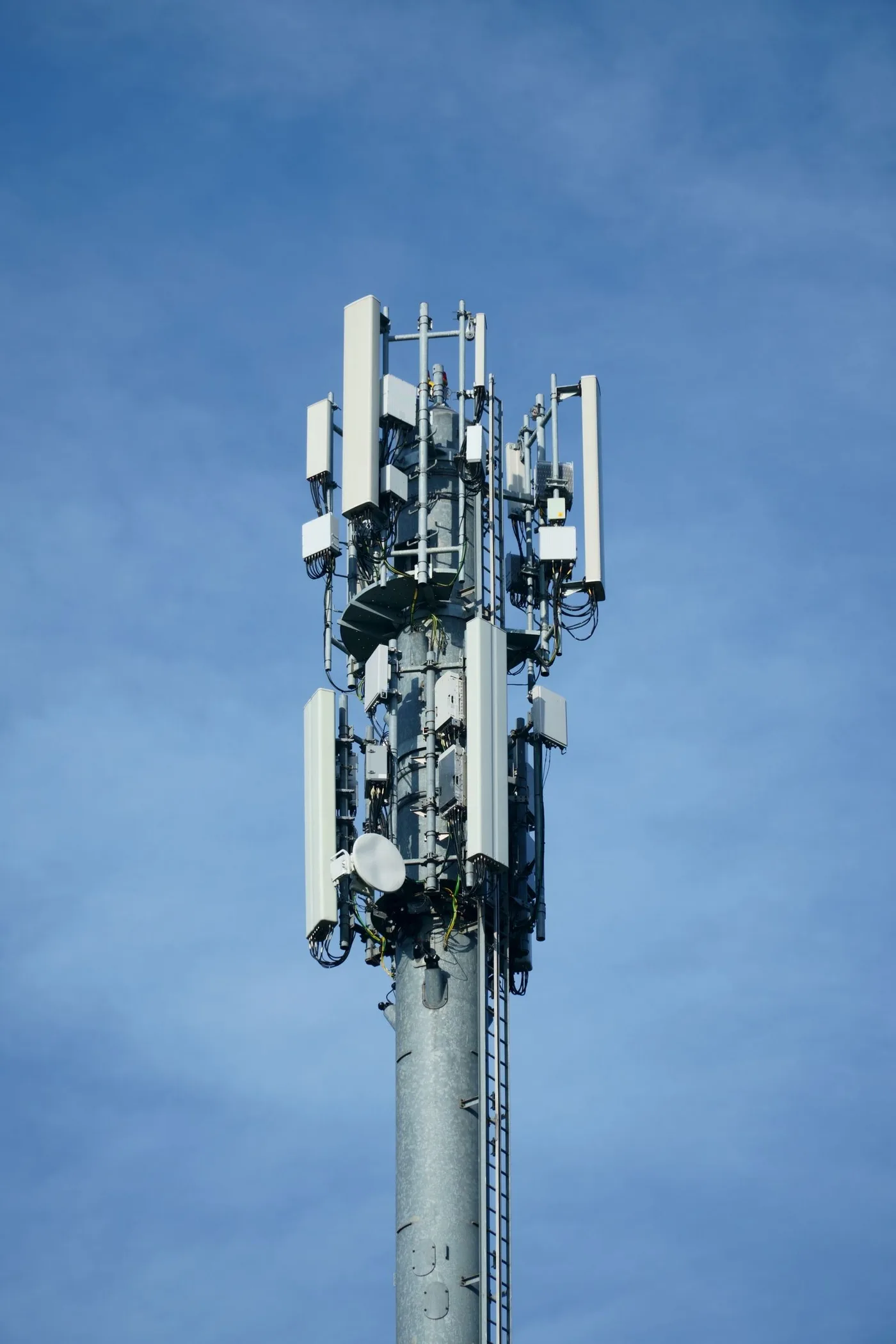 A telecommunications mast carrying cellular antennas