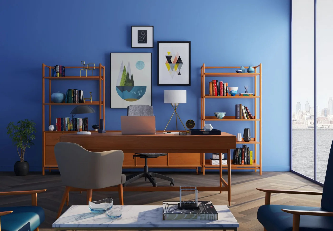 Bright blue-walled office with a wooden desk, laptop and a city view window